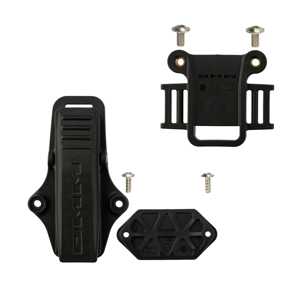 Caiman by DMM, black plastic parts with screws on a white background, including clip and brackets
