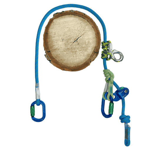 hipSTAR Glide 11.5 rope with two blue carabiners and metal eyelet, wrapped with green-yellow rope, lies around a tree trunk