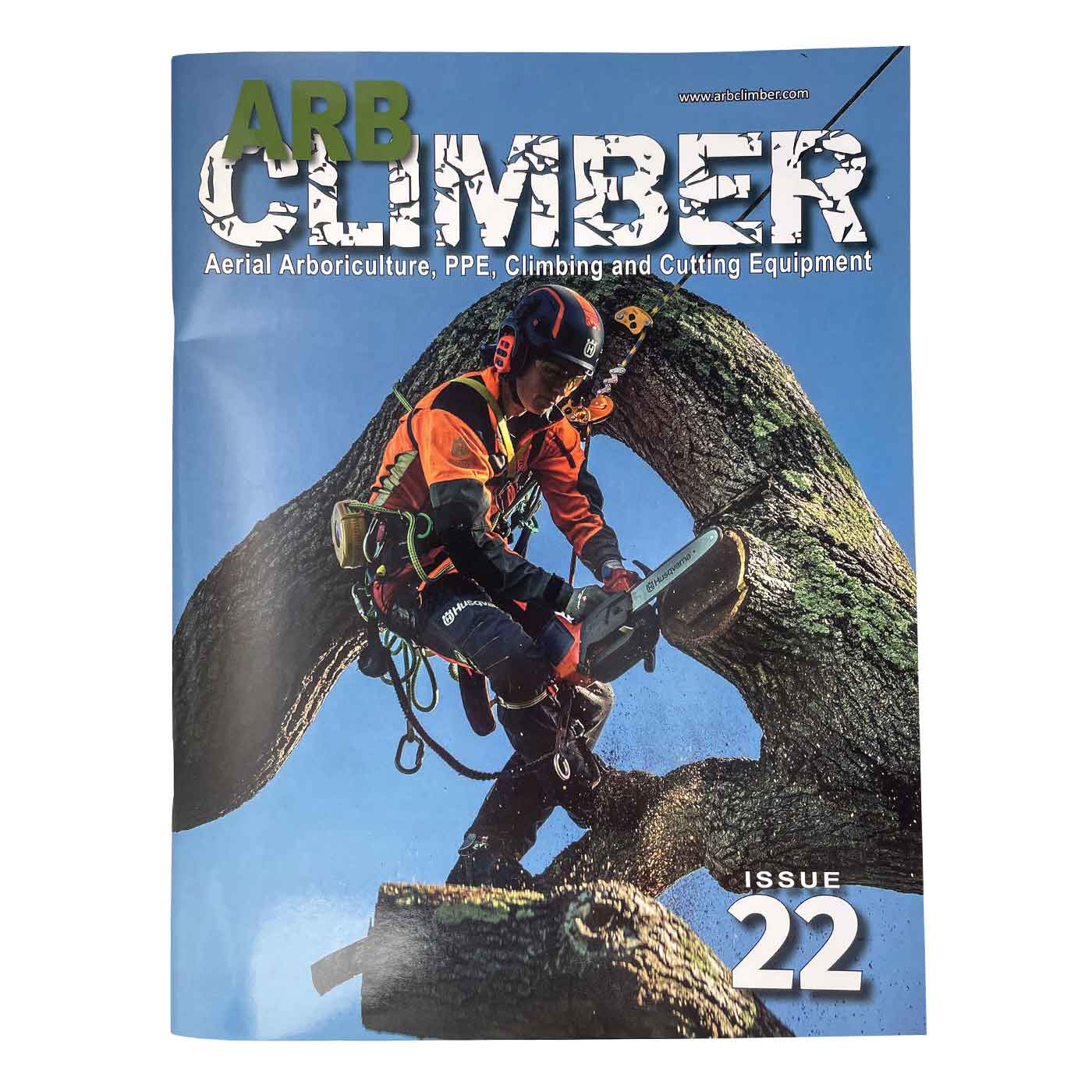 Arb Climber No. 22 magazine with title and image of an arborist using a chainsaw on a tree, blue background