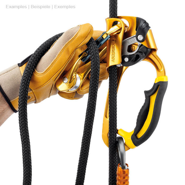 Rollclip A snap hook in orange on black rope, held by a hand with yellow glove, connected to a yellow and black climbing device and an orange snap hook at the bottom