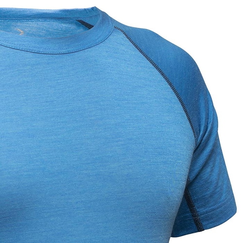 Close-up of blue merino Tencel shirt with visible stitching on sleeve and crew neck
