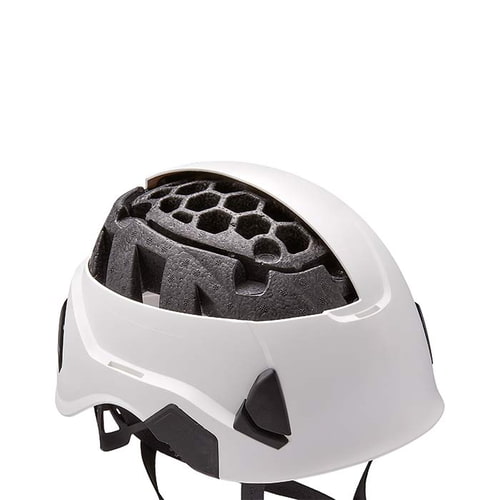 White PETZL Strato Vent helmet with visible inner shell made of black foam