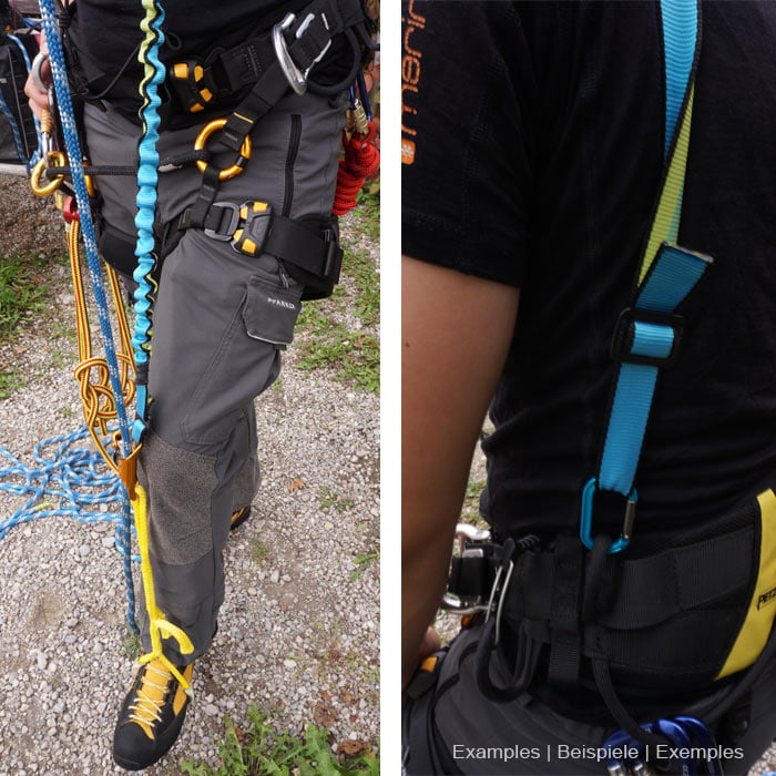 Bungee tool in blue with elastic, wavy section and flat webbing with black trim and green inner stripe on grey outdoor pants with climbing equipment and yellow and black mountain boots