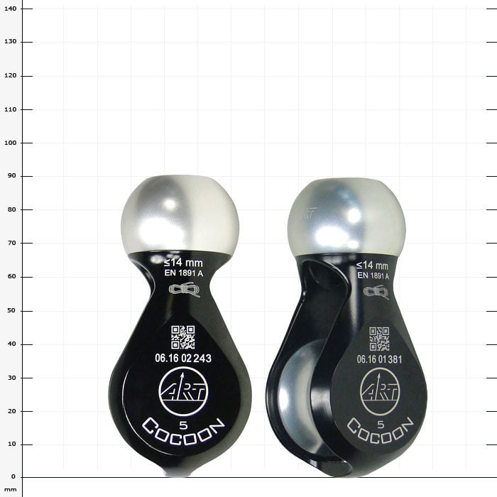 Two black, teardrop-shaped Cocoon 5 pulleys from ART with silver ball bearings and white prints