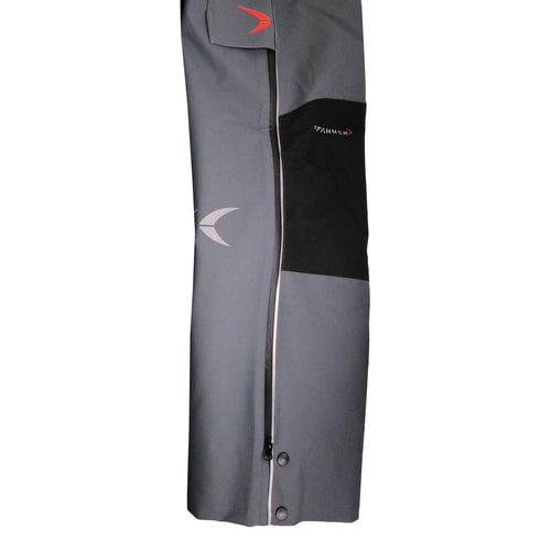 Nanoshield® EVO rain pants in grey with side zipper and buttons on the lower leg, black knee reinforcement and red logo above the pocket