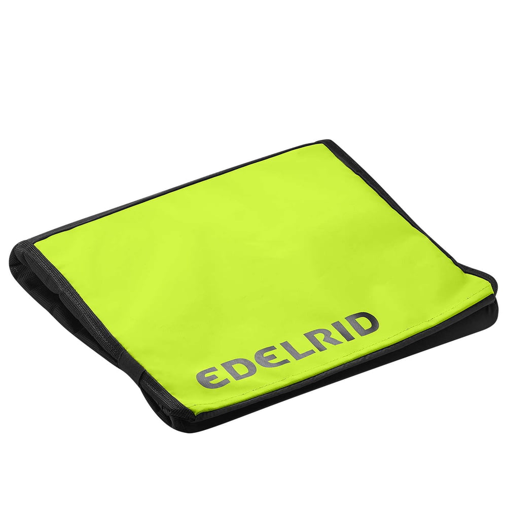 Folded green mat with black border and the lettering Edelrid, model Houston