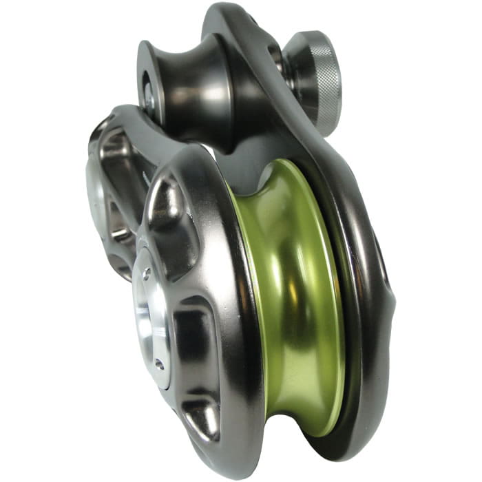 Impact Block L, grey metal block with green wheel, side view
