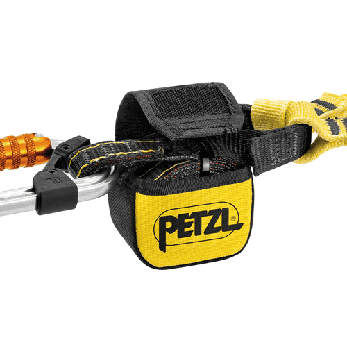 Detail of a yellow and black pad with the Petzl logo attached to a part of the Petzl Absorbica-Y MGO with yellow and black straps