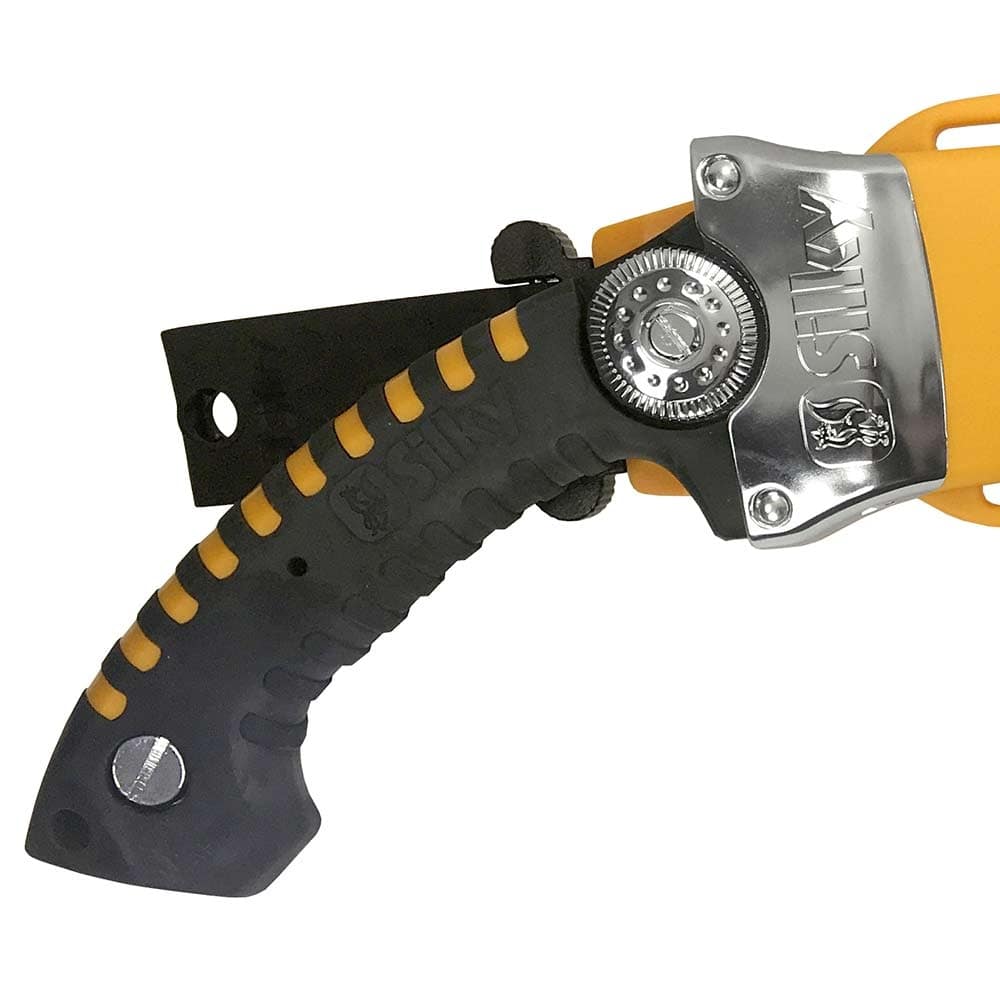 Close-up of the black handle of the Silky Sugoi 330-6.5-5.5 handsaw with yellow accents and metal clasp on the sheath