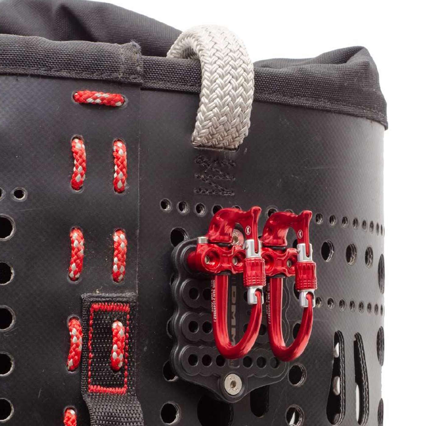 Micro Vault by DMM, two red carabiners with screw cap attached to a black bracket with red stitching