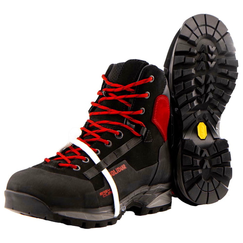TreeClimb black mountaineering boot with red laces and red heel pad, one shoe sole is visible with profile and yellow logo