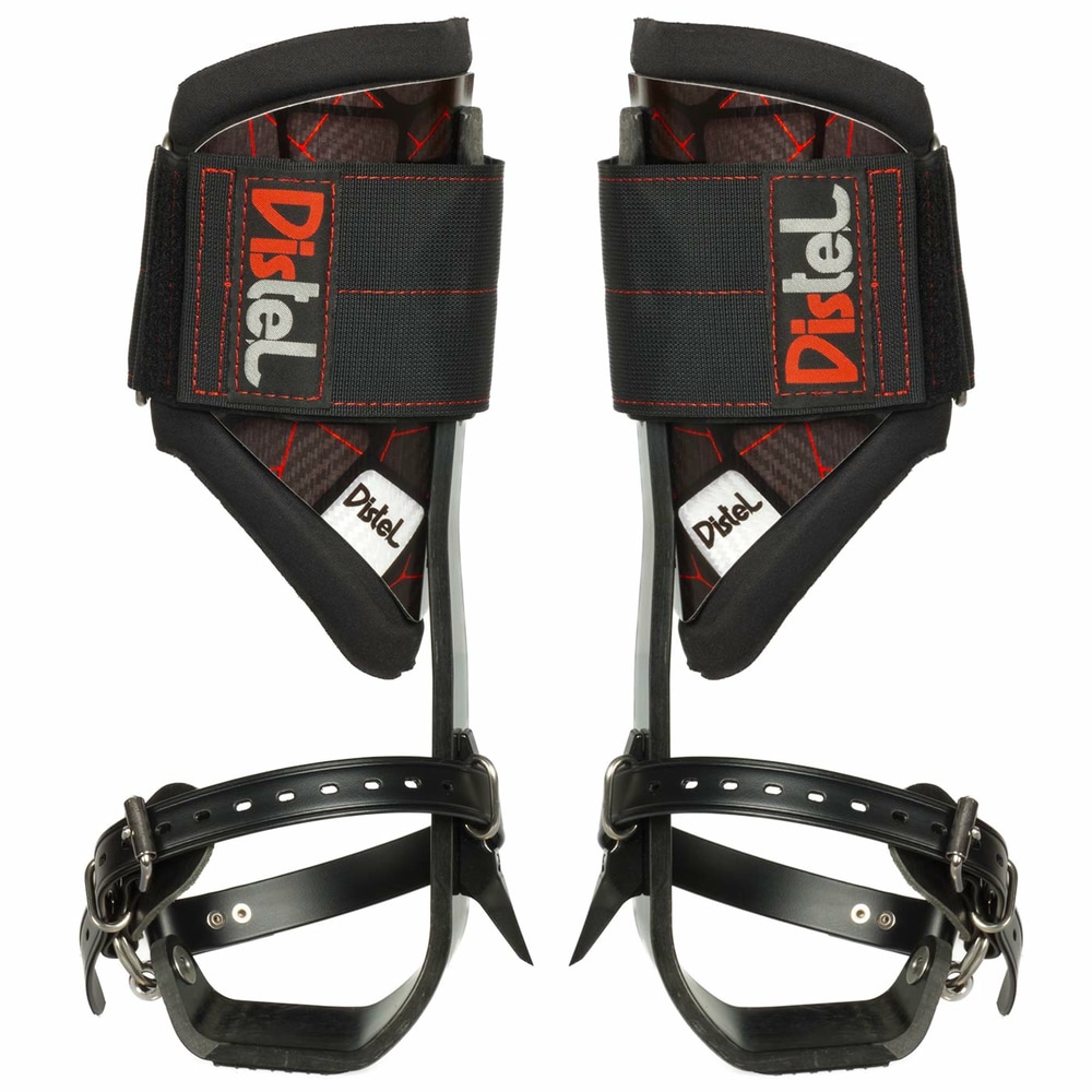Distel Carbon 3.1 Classic by Distel, pair of black carbon rails with red stitching and large Velcro straps with Distel logo, foot straps with buckles