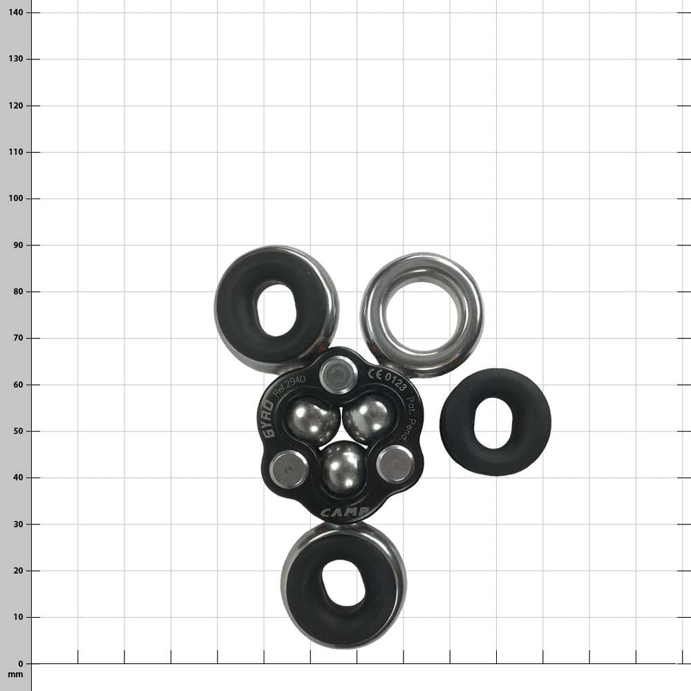 Gyro 3, manufacturer CAMP, black and silver metal component with three ring-shaped openings, one of which is detached, against a checkered background
