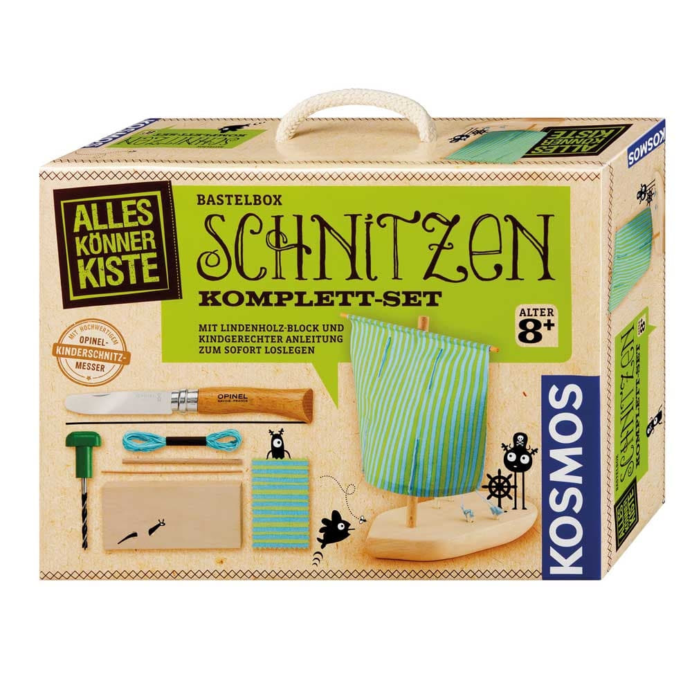 Kosmos Schnitz Set craft box with green label, wooden boat with blue-green striped sail, Opinel children's carving knife, drill and other craft materials shown on packaging