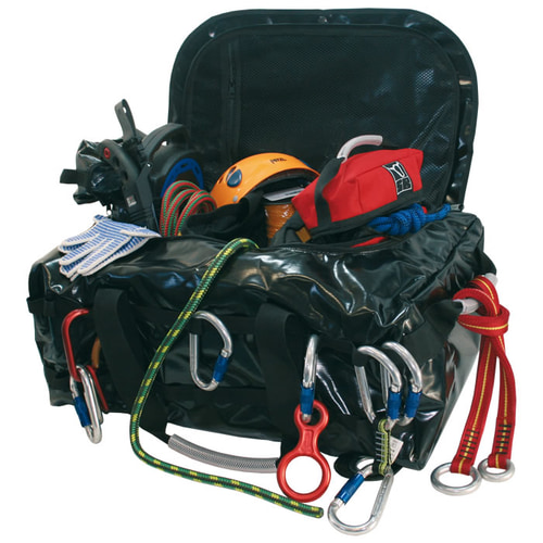 Multiuse bag in black opened with various climbing equipment such as carabiners, helmet and ropes inside