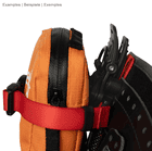 Caiman by DMM, red ribbon attached to an orange zippered bag with black Velcro closure