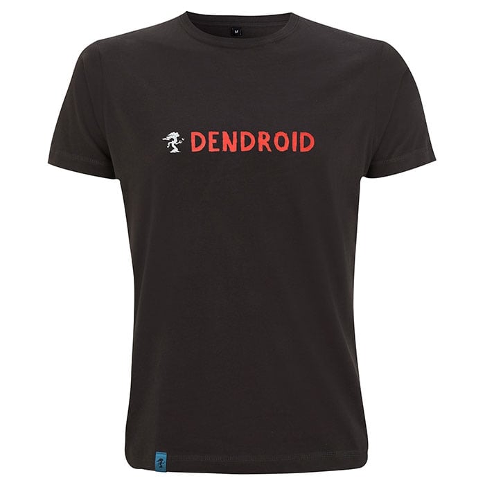 Dream Day T-shirt by DENDROID in black with a large, round motif on the back, which shows a landscape with trees, mountains, a moon, a helicopter and a person with a helmet