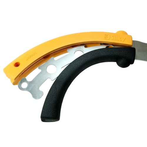 Close-up of the yellow and black handle of the Tsurugi Curve 270-10 handsaw with partially visible metal blade
