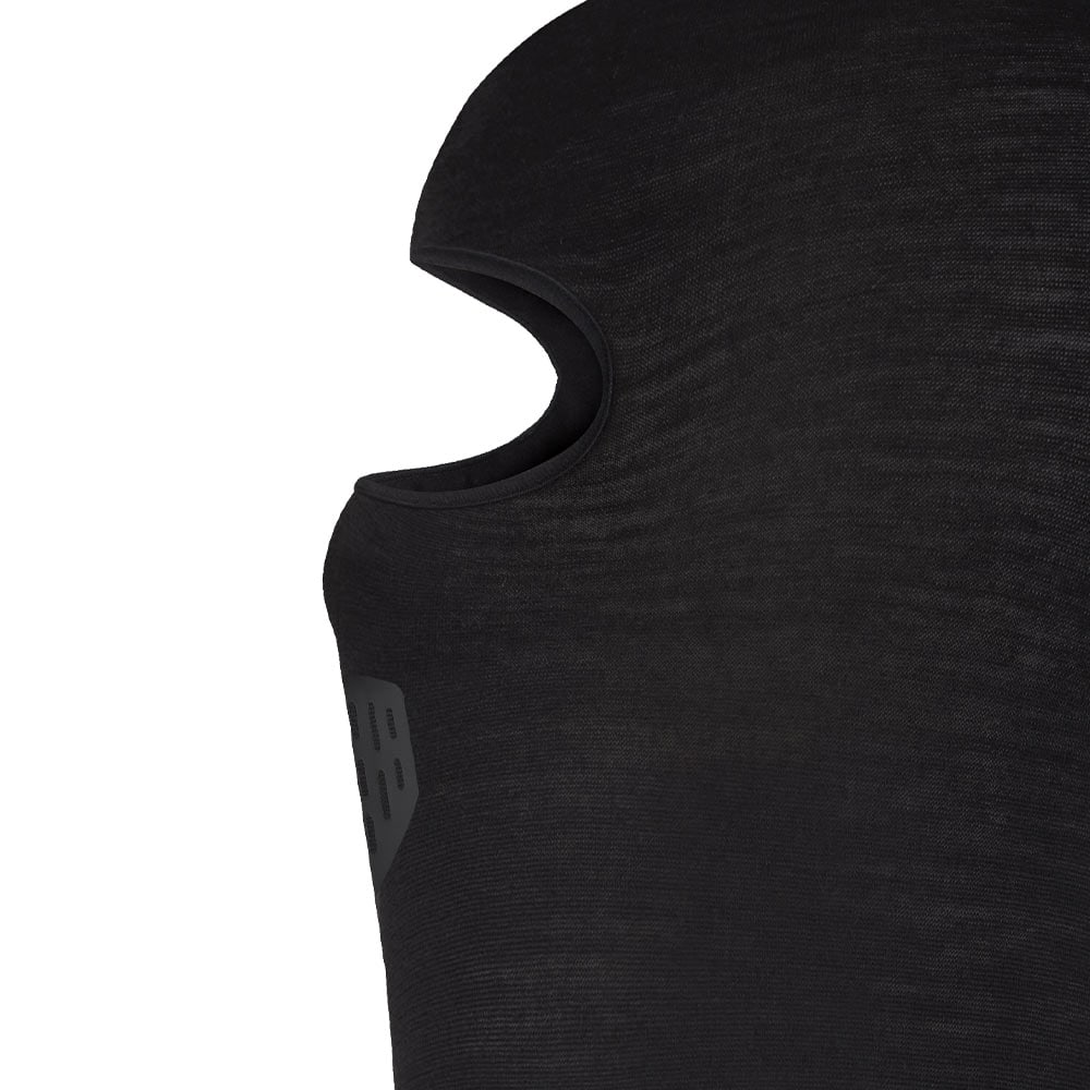 Detail of the black Balaclava Merino by Buff with face opening and textured material