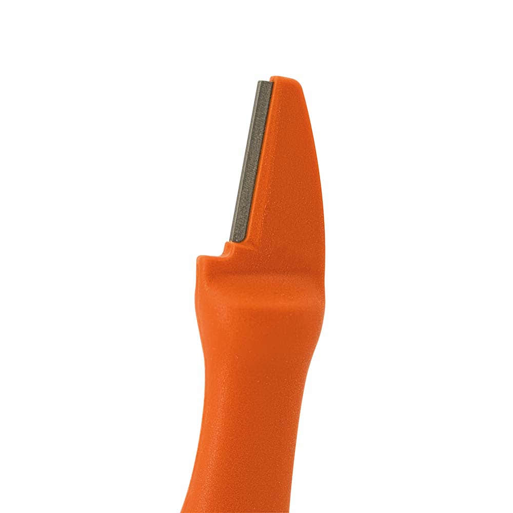 Close-up of the blade sharpener tip in orange with visible grinding surface