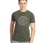 Man wearing the olive green treeslice T-shirt with a white tree trunk cross-section motif, blue jeans