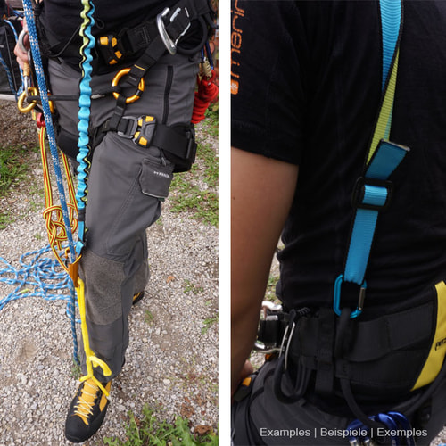 Bungee tool in blue with elastic, wavy section and flat webbing with black trim and green inner stripe on grey outdoor pants with climbing equipment and yellow and black mountain boots