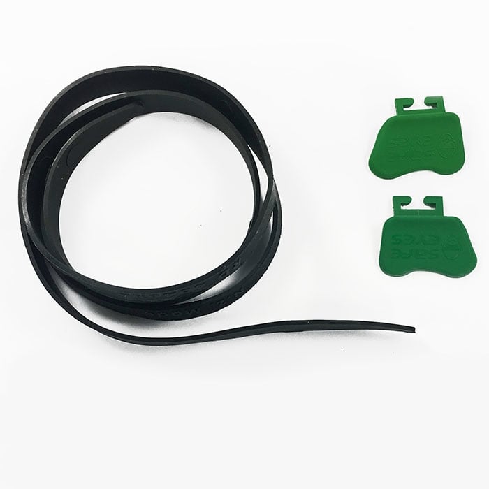 Mesh goggles headband, black elastic band rolled up, next to it two green plastic parts