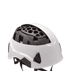 White PETZL Strato Vent helmet with visible inner shell made of black foam
