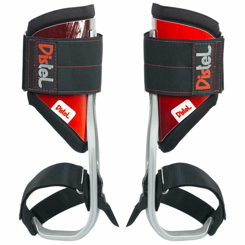 Distel Alu 3.1 Velcro by Distel, two foot spurs with black Velcro and red wooden parts, slightly photographed from a different perspective