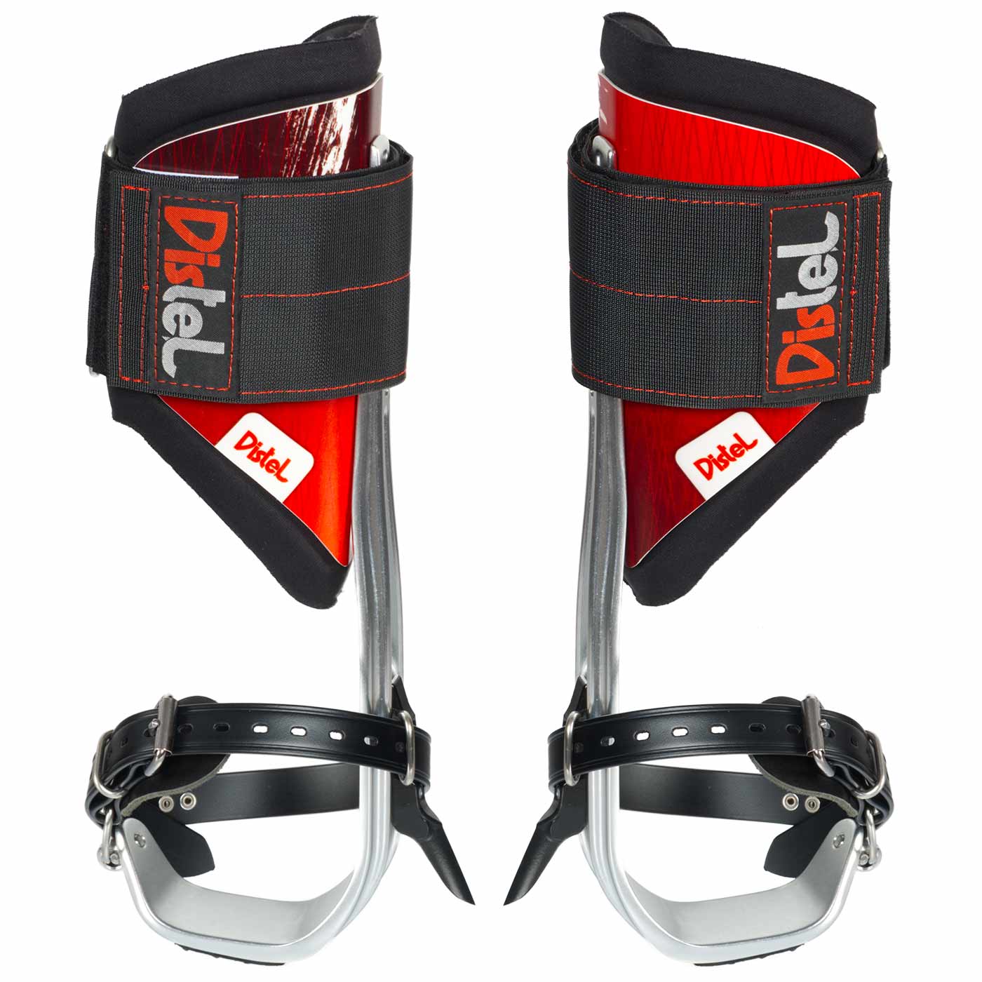 Distel Alu PLUS Classic by Distel, two red aluminum stirrups with black Velcro straps and black straps, lightly photographed from a different angle