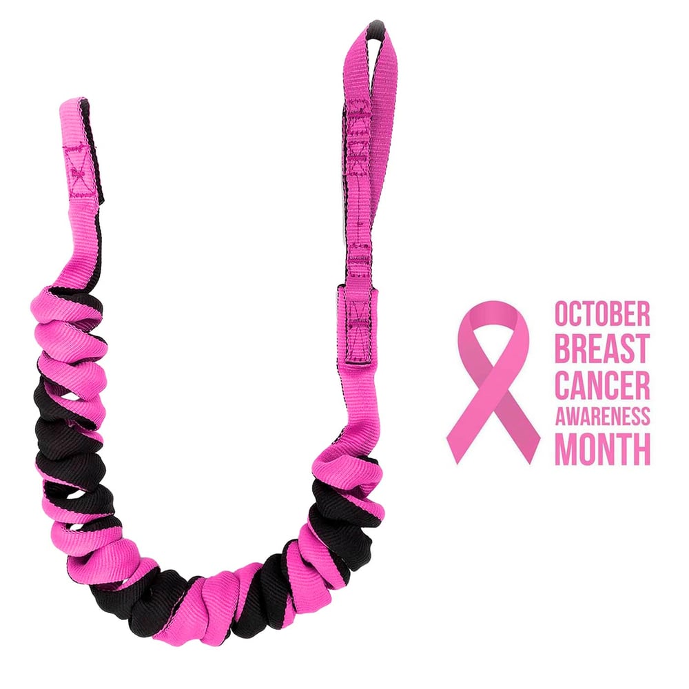 Full Reach lanyard in pink and black, spiral wrapped ribbon with loop ends, next to it a pink ribbon symbol and text "OCTOBER BREAST CANCER AWARENESS MONTH"