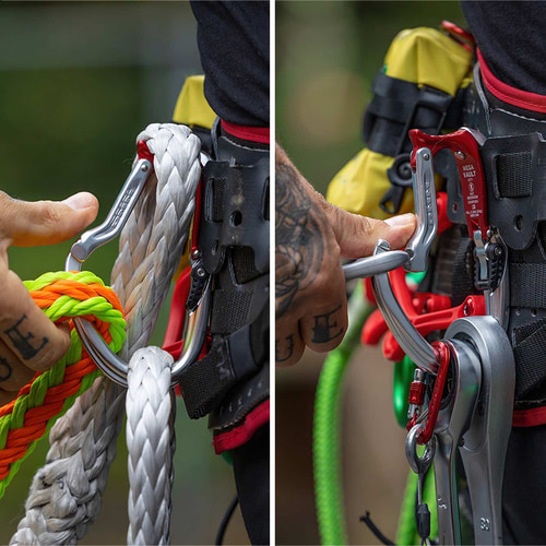 Two close-ups of hands operating the Mega Vault carabiner in silver and red on a black and red strap with ropes