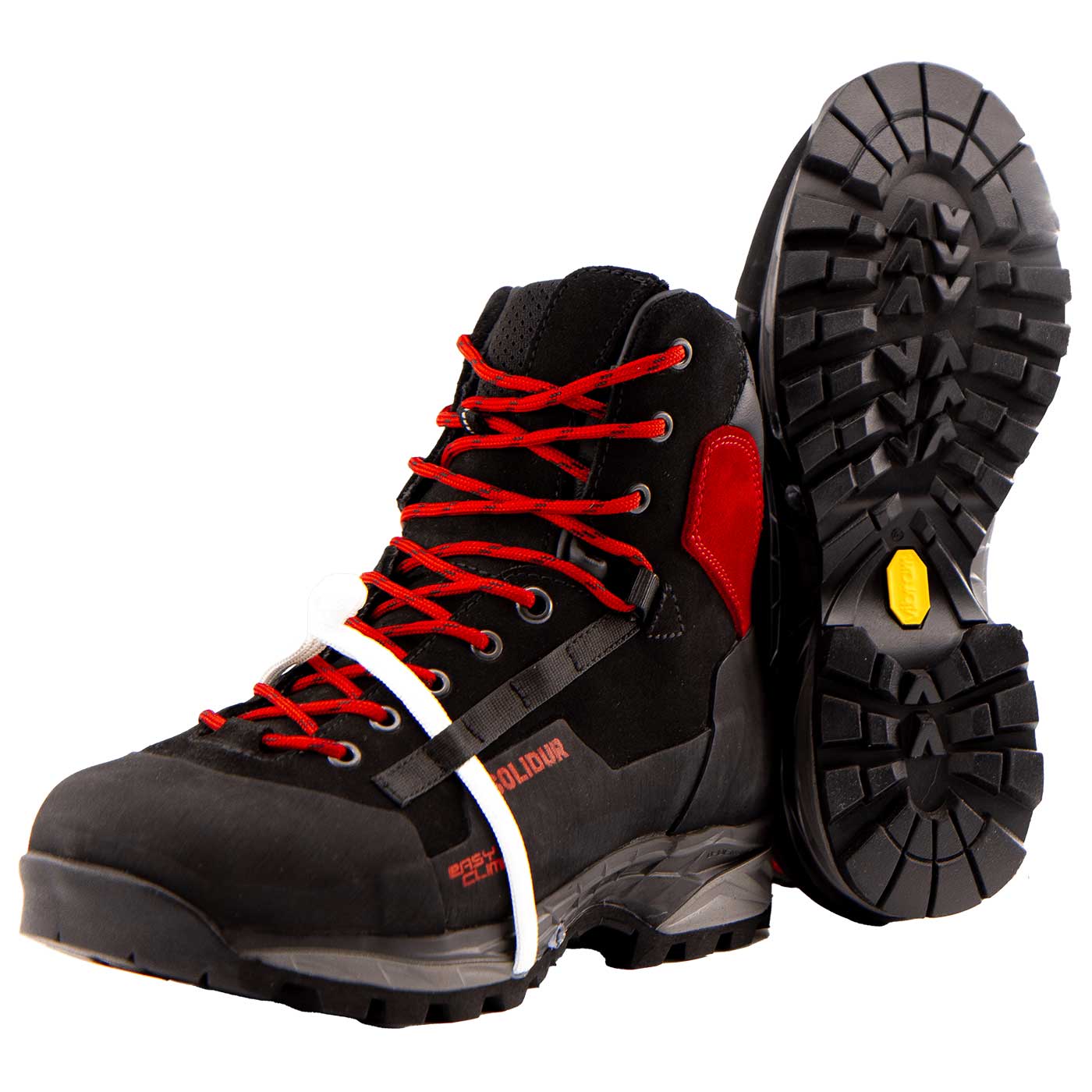 TreeClimb black mountaineering boot with red laces and red heel pad, one shoe sole is visible with profile and yellow logo
