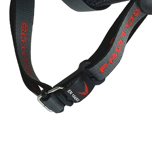 Close-up of the PROTOS® Maclip chin strap with plastic closure and red inscription PROTOS, EN 12492 on the closure