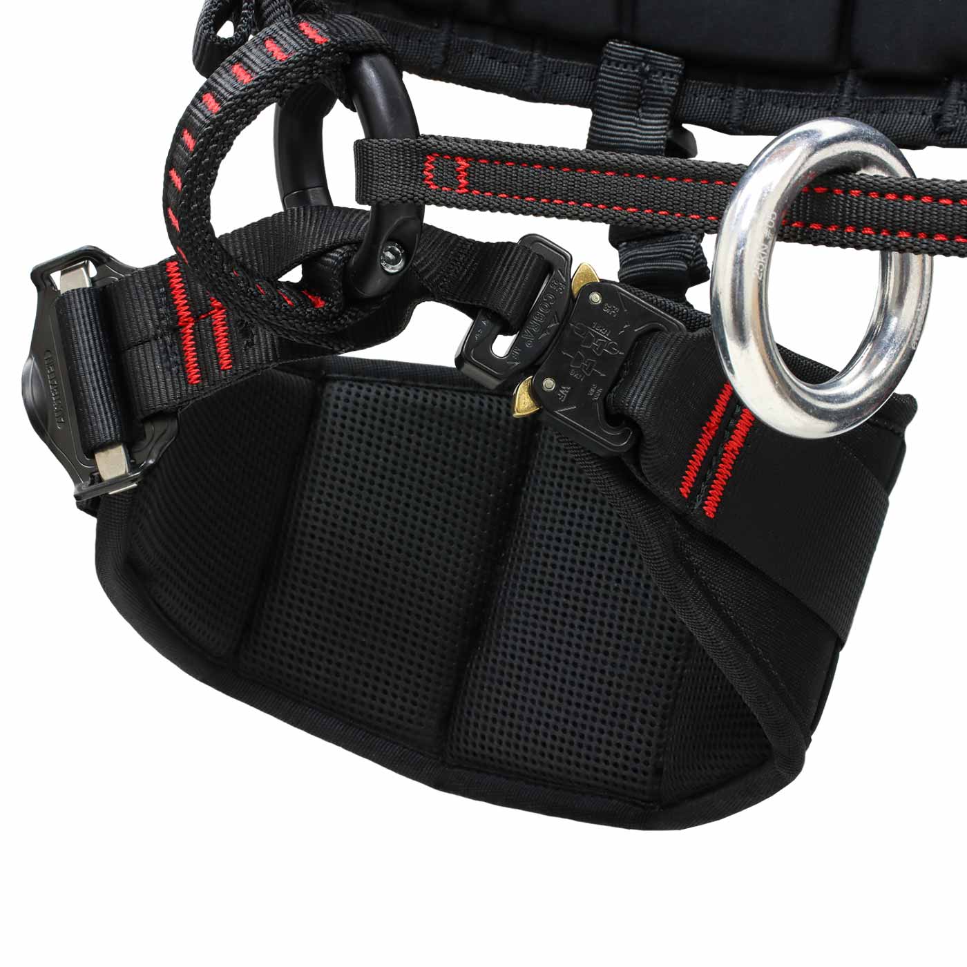 Close-up of the black treeAustria Pro size 3 harness with red stitching, metal rings and buckles on a leg cuff