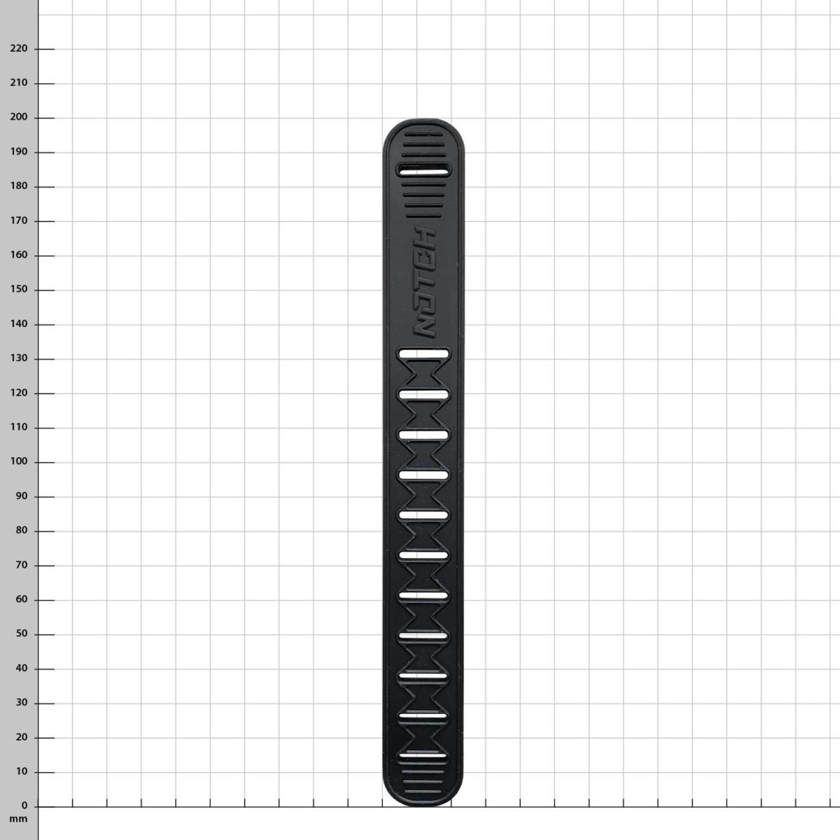 A black Talon rubber strap made of rubber with cut-outs and the lettering "NOTCH" lying on a white grid with millimetre indications