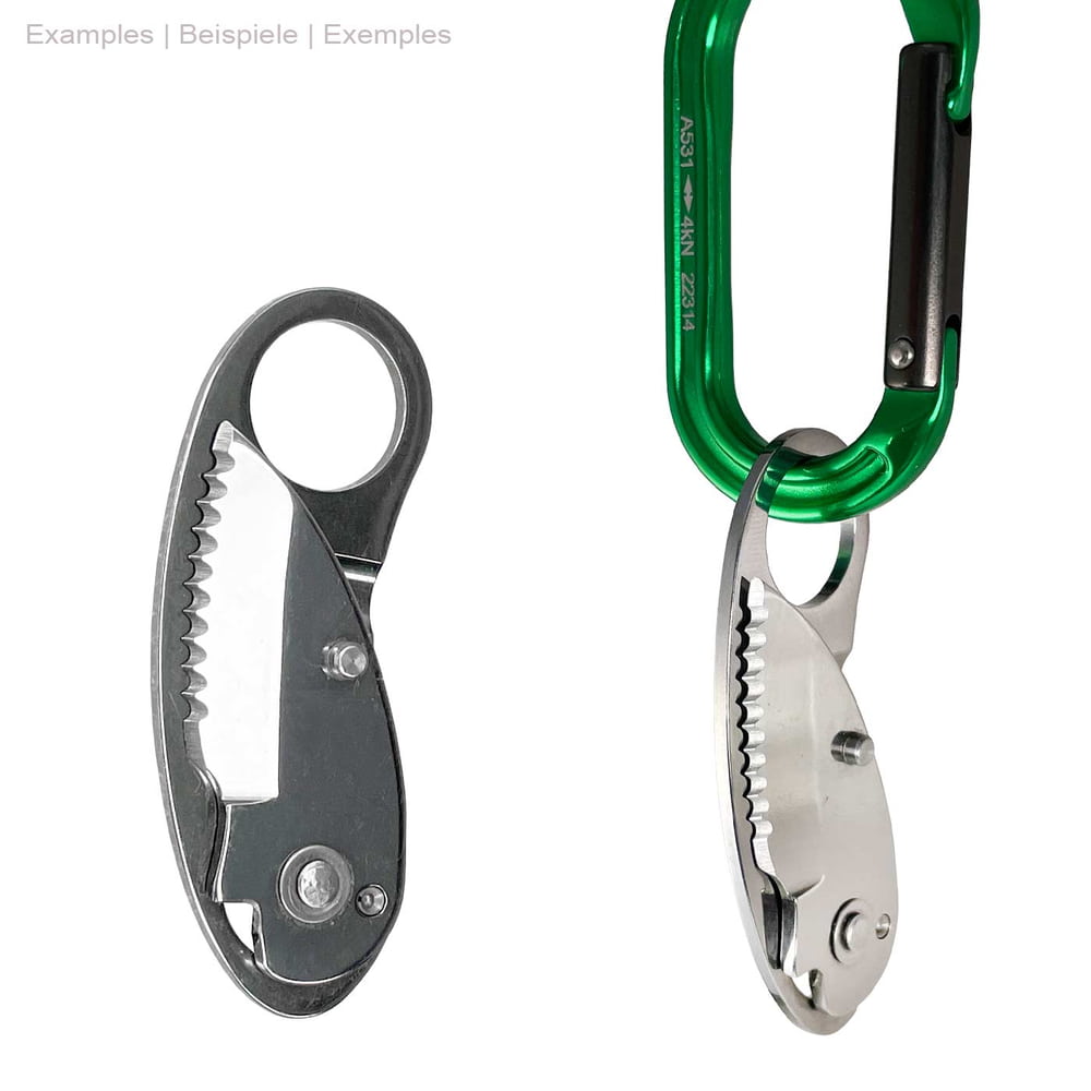 Mini Knife Wave Cut folding knife made of metal, one knife hangs from a green carabiner, the other knife lies next to it