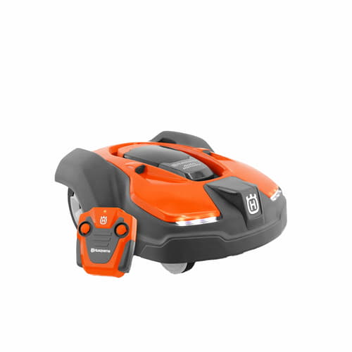 Children's Automower by Husqvarna, orange and black play lawn mower with remote control against white background