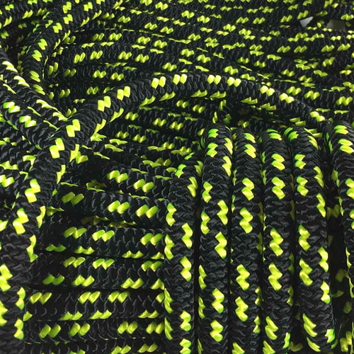 XP-e Bahamas rope in black and neon yellow, braided, rolled up and loosely laid, general view
