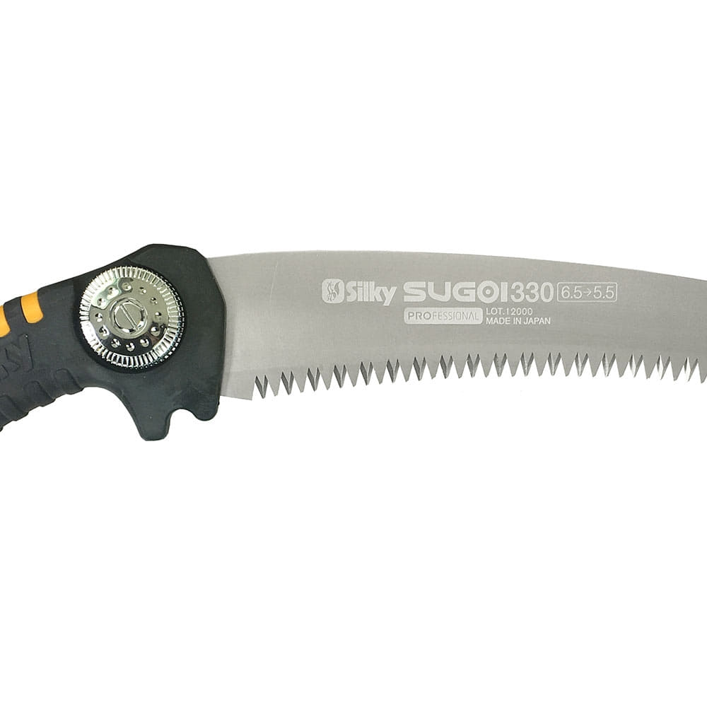 Close-up of the curved saw blade of the Silky Sugoi 330-6.5-5.5 handsaw with visible manufacturer and model print
