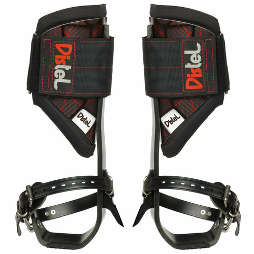 Distel Carbon 3.1 Classic by Distel, pair of black carbon rails with red stitching and large Velcro straps with Distel logo, foot straps with buckles, from the back