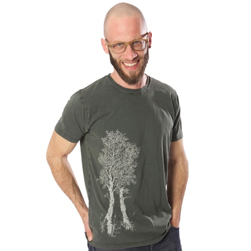 Man wearing an olive green Birch Tree T-shirt with a white tree motif on the left front