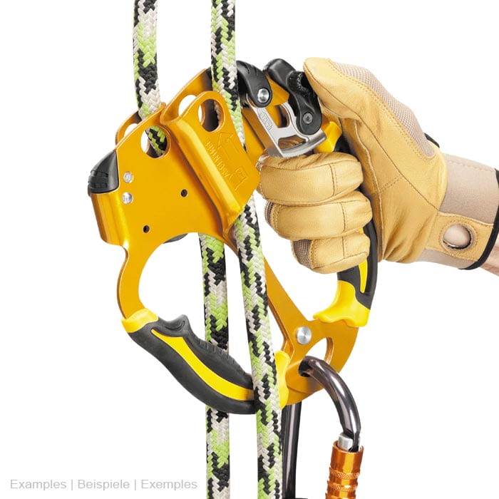 Ascentree yellow climbing frame with black handles, held by a hand with beige gloves, attached to a rope with snap hook