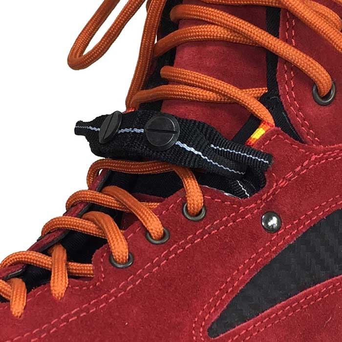 Close-up of the ClipnStep EZloop hiking shoe in red and black with orange laces, focus on a black loop with two black buttons above the laces