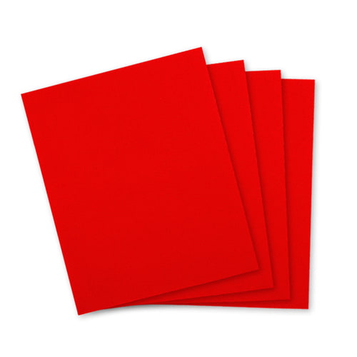 Patch fabric in red, four square pieces of fabric lying on top of each other