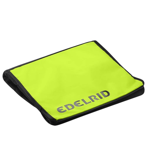 Folded green mat with black border and the lettering Edelrid, model Houston