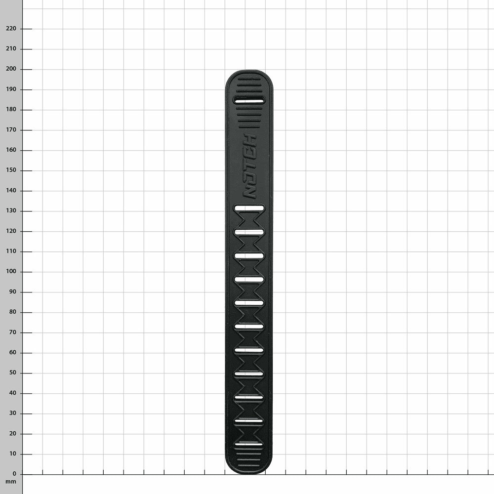 A black Talon rubber strap made of rubber with cut-outs and the lettering "NOTCH" lying on a white grid with millimetre indications