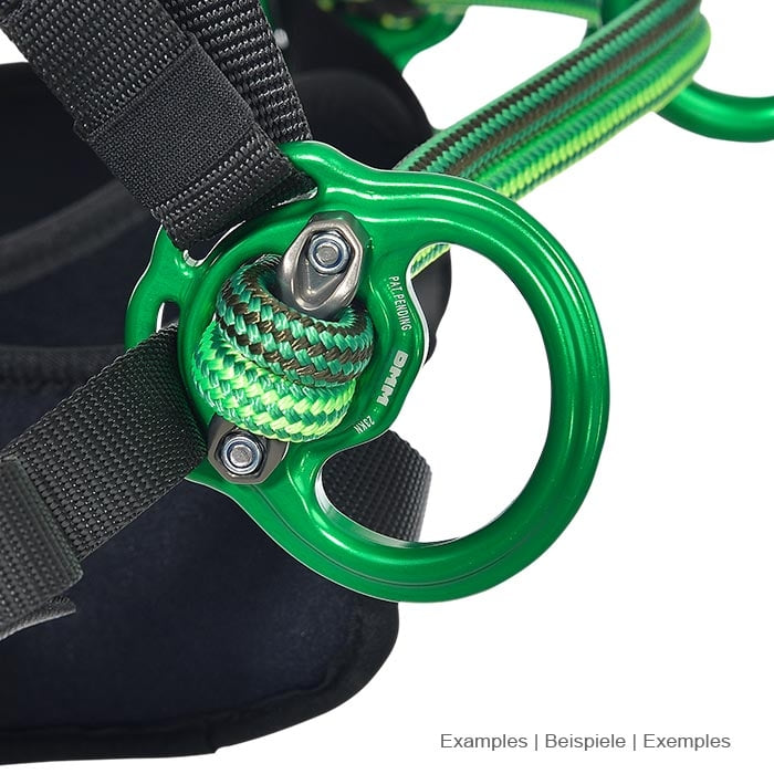 treeMOTION Evo rope bridge showing a green metal ring part with attached rope and black straps, close-up