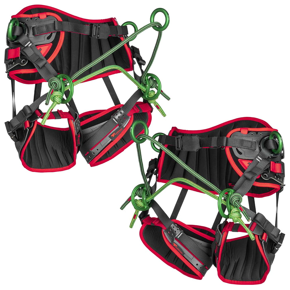 treeMOTION Pro X Climbing harness from diagonal front with black and red pad, green metal rings and green ropes, manufacturer Trufilanger
