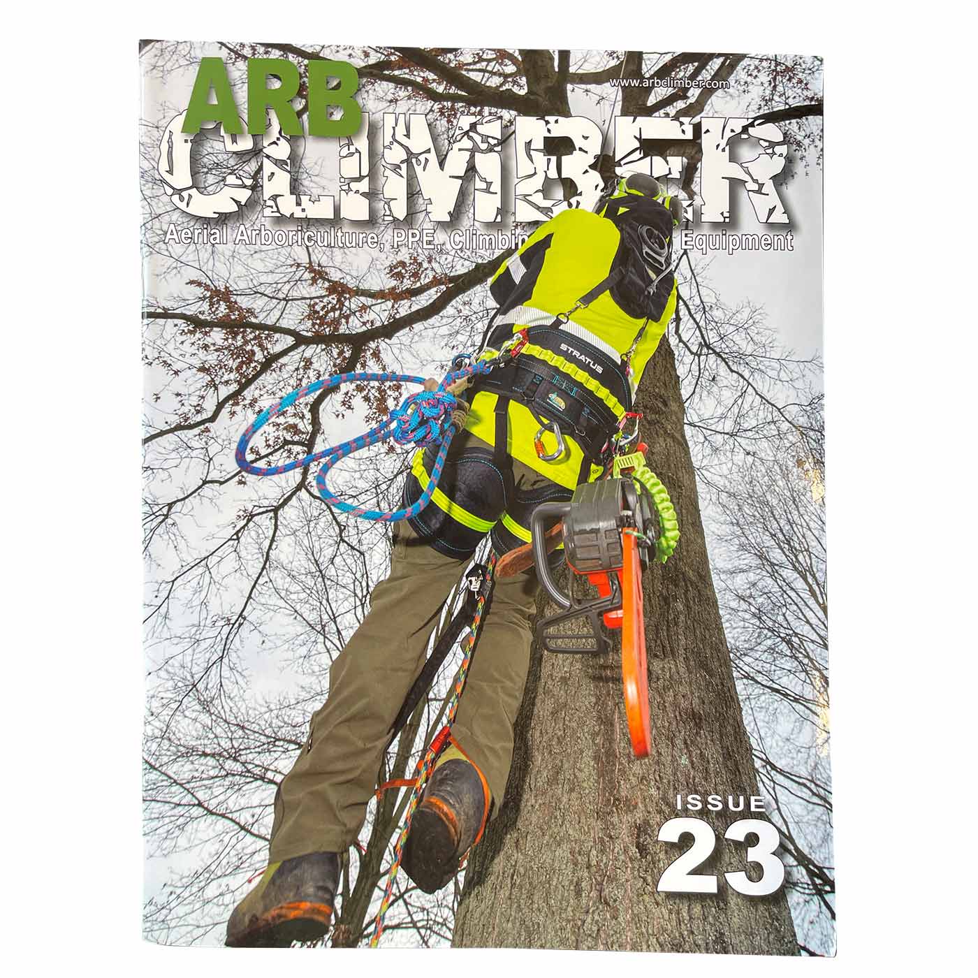 Arb Climber No. 23 magazine with a climber in yellow protective clothing on a tree trunk, chainsaw on the side, title in large letters at the top and issue number 23 at the bottom right